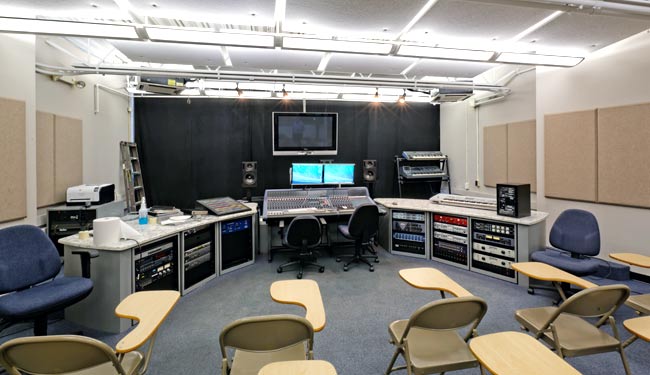 Music business management classes can take place in an actual recording studio.